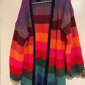 Gorgeous rainbow colors and comfy fit. But I have enough sweaters. Never worn!
